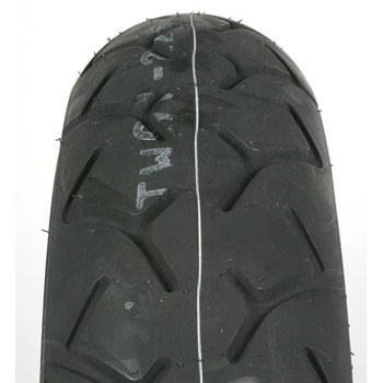 Exedra G Tire closeup front view, showing tread pattern